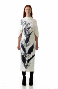 White midi dress with black print by Cunnington & Sanderson